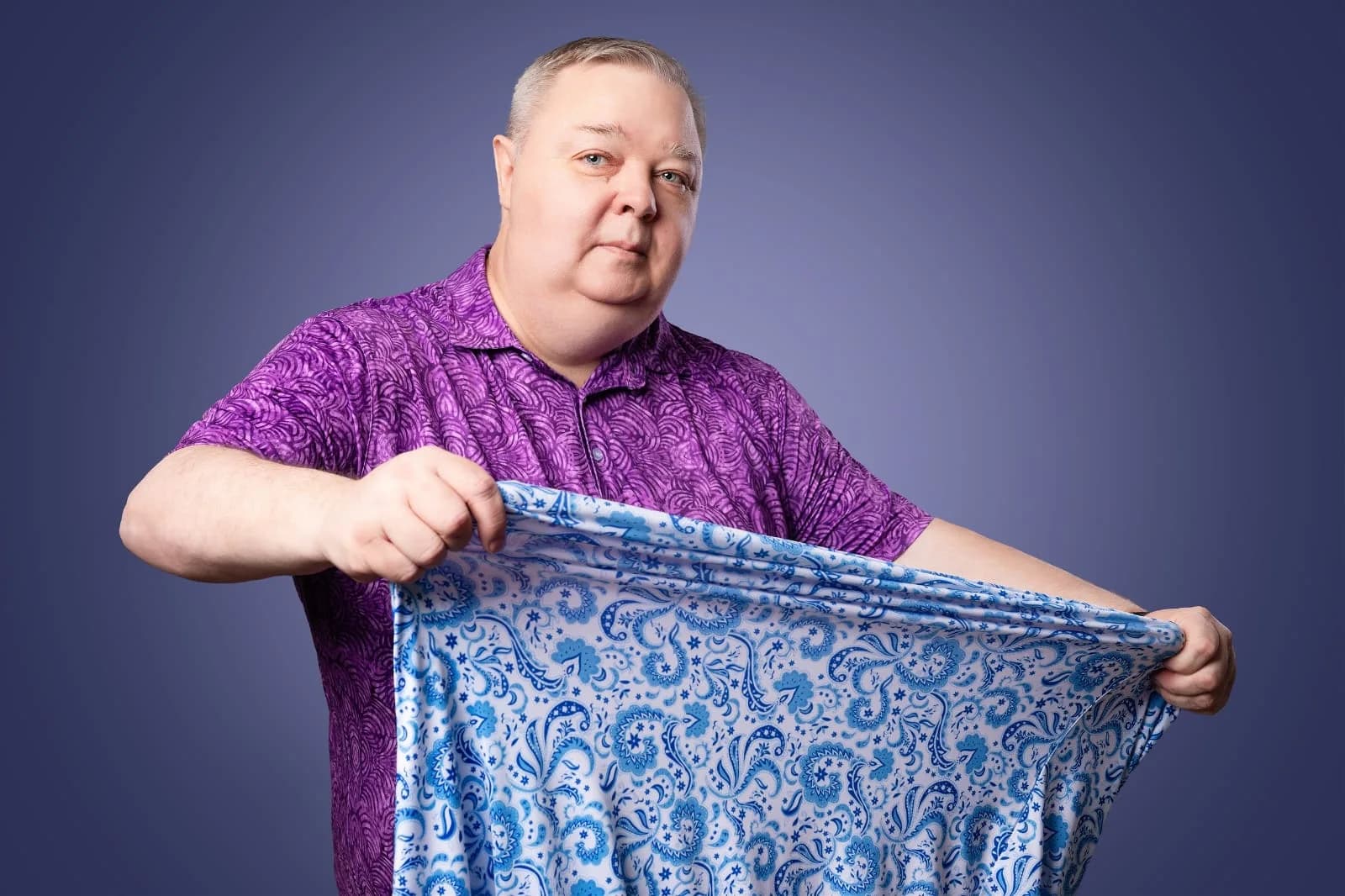 Peter Silver Reich stretching the Silver Sharq premium jersey fabric with both hands